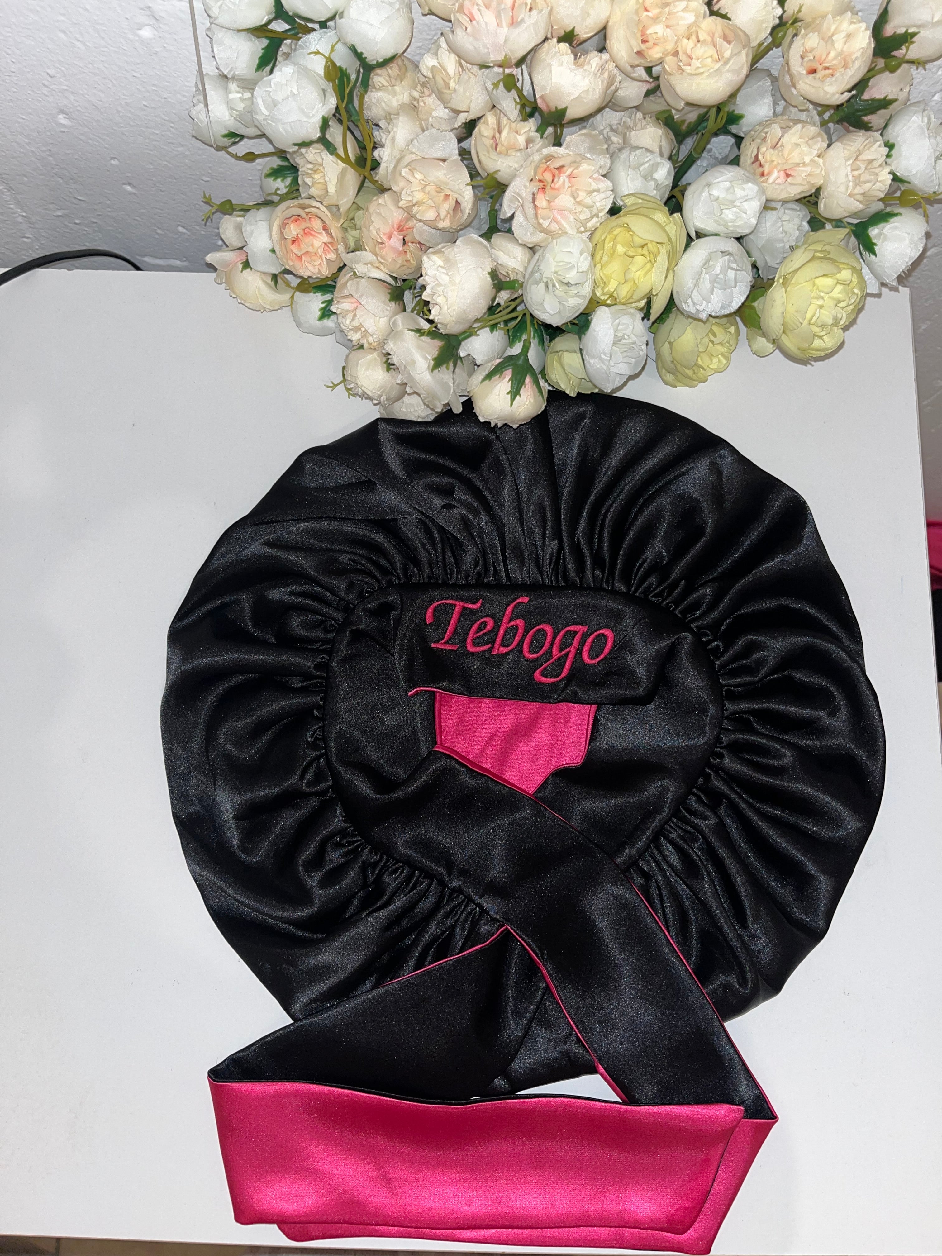 Pink and black hair bonnet