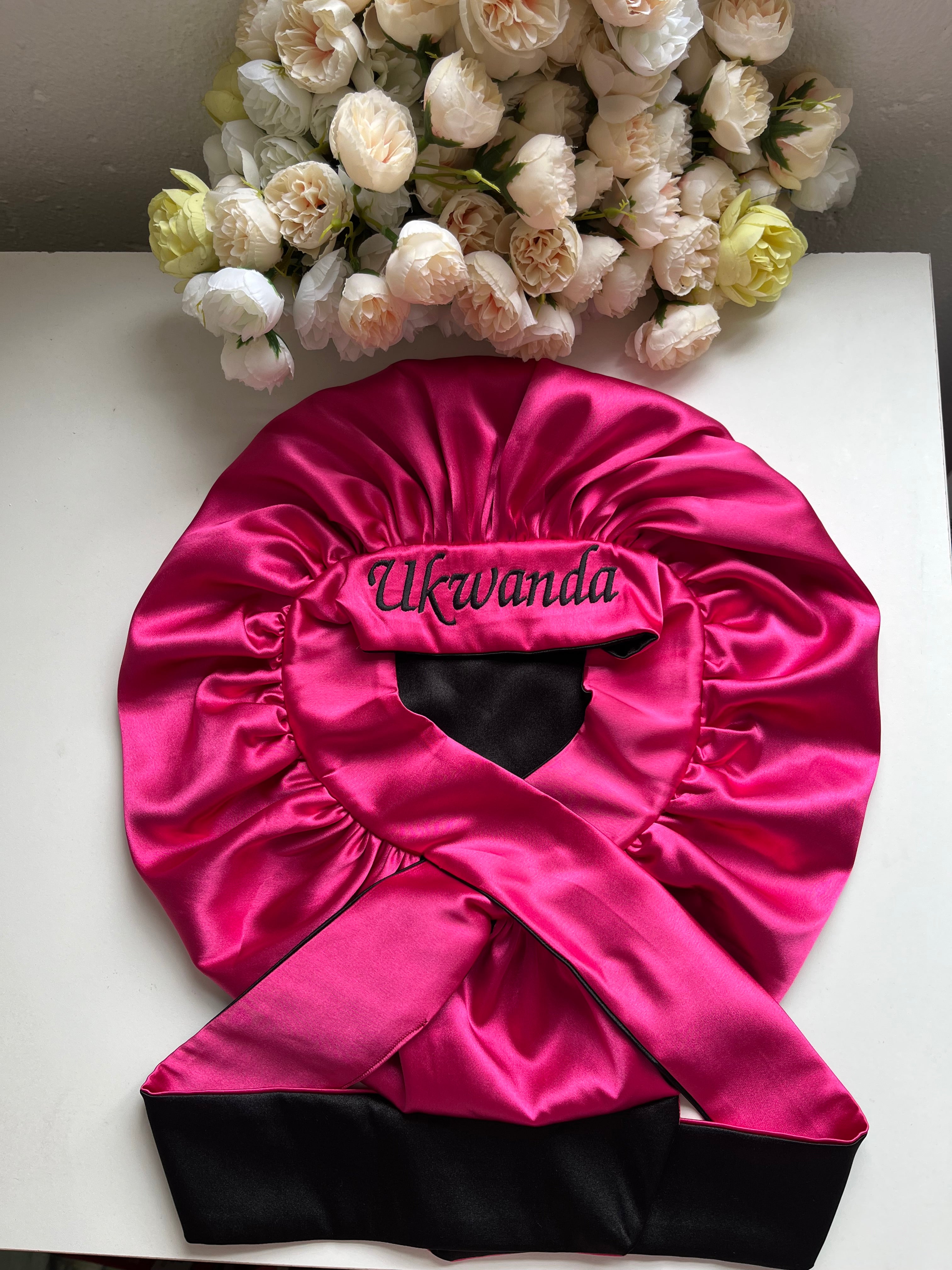 Pink and black hair bonnet