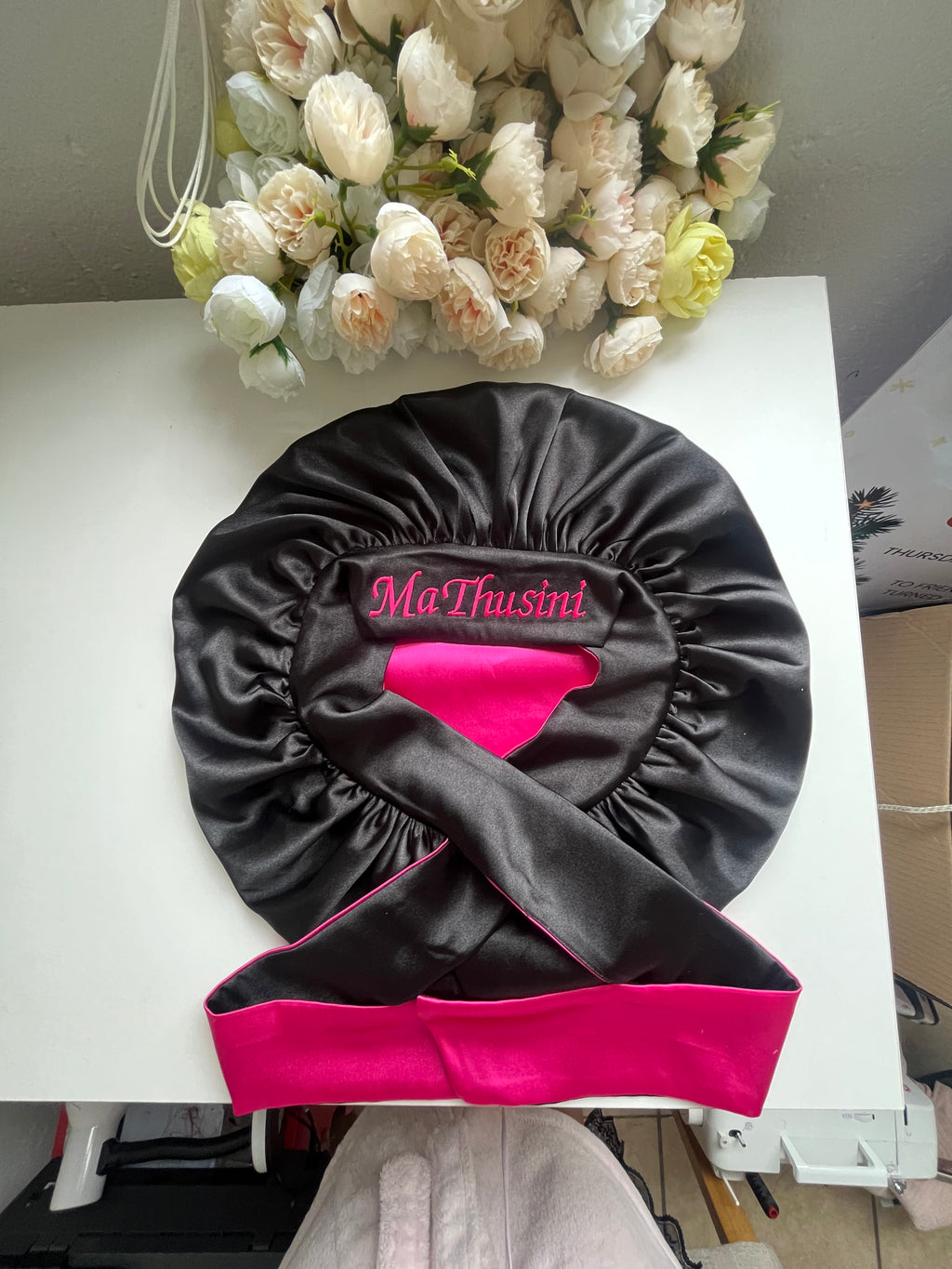 Pink and black hair bonnet